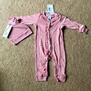 Gerber size 6-9 Months pink coverall type onesie. Long sleeve. NWT with hat